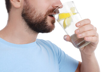 Sticker - Man drinking water with lemon on white background, closeup