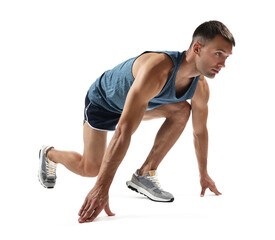 Poster - Sportsman in starting position for run on white background