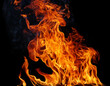 © MdRakibul - Flame Flame Texture For Strange Shape Fire Background Flame meat that is burned from the stove or from cooking. danger feeling abstract black background Suitable for banners or advertisements.