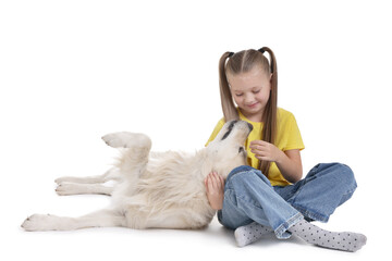 Canvas Print - Girl with her cute Golden Retriever dog on white background