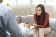 © KMPZZZ - Psychology, depression. Sad asian young woman consultation with psychologist while patient counseling mental therapy, doctor hand taking notes at clinic. Psychologist with sick mental health person.