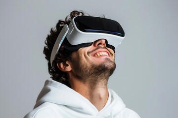 Man with VR set, white background, gaming innovation