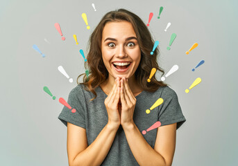 Excited woman surrounded by colorful exclamation marks on gray background - joyful expression concept