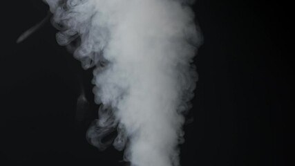 Wall Mural - close-up of white smoke clouds against a black background. contrast of brightly lit smoke and dark r