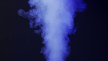 Wall Mural - close-up stream of white smoke on a black background with blue neon light. contrast of brightly lit 