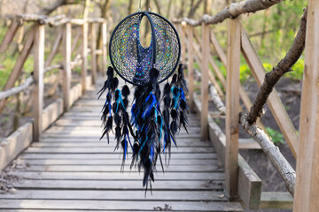 Wall Mural - Handmade dream catcher with feathers threads and beads rope hanging