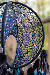 Wall Mural - Handmade dream catcher with feathers threads and beads rope hanging