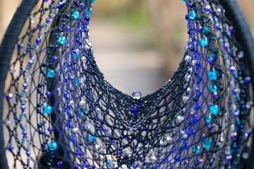 Wall Mural - Handmade dream catcher with feathers threads and beads rope hanging