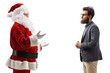 © Ljupco Smokovski - Profile shot of a bearded man and santa claus having a conversation