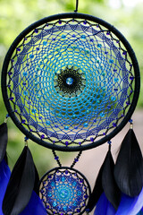 Wall Mural - Handmade dream catcher with feathers threads and beads rope hanging