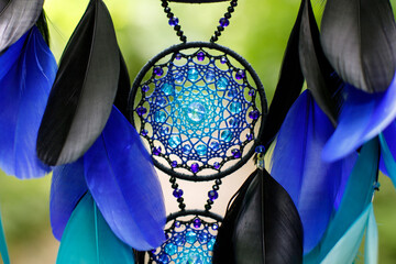 Wall Mural - Handmade dream catcher with feathers threads and beads rope hanging