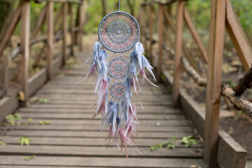 Wall Mural - Handmade dream catcher with feathers threads and beads rope hanging