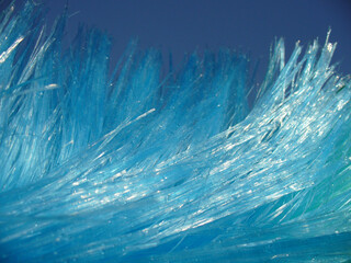 Poster - Abstract blue background with artificial hair and blue sky. Topics: abstraction, close-up, color, calm, shine, texture, surface
