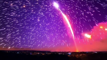 Poster - Long exposure of an airplane flying through the night sky leaving trails of light with a city full of lights in the distance