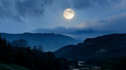Poster - Bright full moon is illuminating a mountain landscape at night, with clouds passing by and a river flowing in the valley