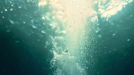 Aufkleber - Sunlight filters through water, illuminating a stream with mesmerizing bubbles. Turquoise, blue, and green hues add tranquility to this refreshing underwater scene
