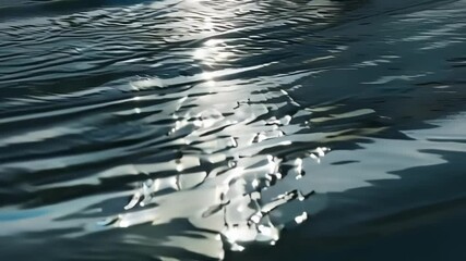 Aufkleber - Light reflecting on a wavy water surface creating an abstract pattern, perfect for backgrounds and designs related to nature, tranquility, and relaxation