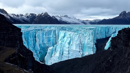 Aufkleber - Tourists marvel at stunning glacier seracs in , surrounded by icy blue landscape and towering peaks, showcasing nature's beauty in a remote, wild environment