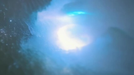 Aufkleber - Sunlight filters through water, casting a radiant glow on a curling ocean wave. Vibrant turquoise hues create a mesmerizing seascape, capturing the power and energy of crashing waves