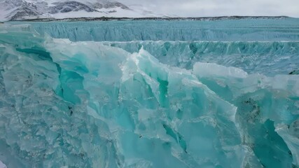Aufkleber - Melting turquoise ice in  shows climate change impact. Beautiful yet fragile landscape highlights nature's delicate balance. Protect our planet now