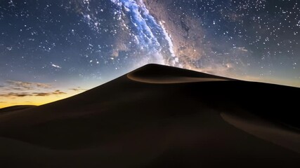 Aufkleber - The milky way galaxy shines brightly over a sand dune at night, with twinkling stars creating a stunning display of nature's beauty