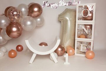 a birthday party with balloons and a sign that says happy birthday.