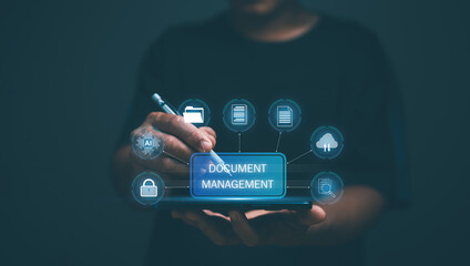 Leinwandbilder - Document management system (DMS) technology concept, Document protection system, Businessman holding smartphone and pen in hand for managing files. Online manage file on central file storage.