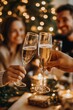© Yevhen - Family celebrates new year at home with joyful champagne toast in light pastel colors