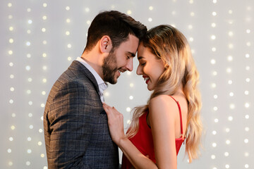 You're My Everything. Portrait of young couple in love bonding, touching foreheads and smiling, celebrating Valentine's Day together, closeup