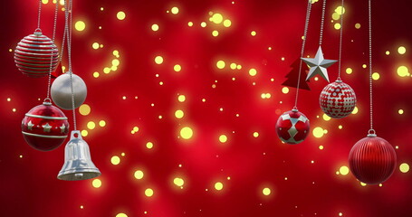 Canvas Print - Image of christmas baubles over light spots on red background