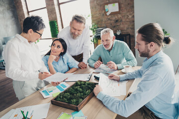 Poster - Photo of teamwork people working together discussion teambuilding comfortable modern office loft room interior indoors workspace