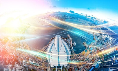 Poster - An aerial view of Hong Kong's skyline with vibrant light trails streaking across the cityscape.
