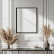 © Infinity Lens - Square frame mockup in matte black, hanging in a contemporary hallway with white walls, a sleek console table, and abstract decor.