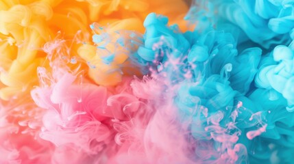 Poster - An abstract image of vibrant pink, yellow, and blue ink swirling and merging in water, creating soft, billowy shapes.