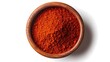 © Engineer Jahid - Red paprika powder in a bowl isolated on white background.