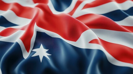 The Australia flag proudly waves in the breeze, a vibrant symbol of national pride against a soft defocused backdrop.