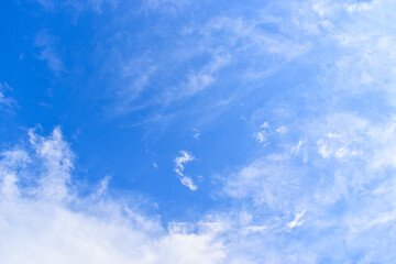 Wall Mural - beautiful blue sky and white fluffy group of clouds with sunrise in the morning, natural background