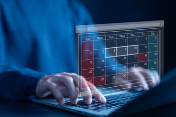 Fototapete - man plan and schedule calendar online on a laptop. concept of managing a planning meeting, arranging appointment agendas in business, and timeline design on technology digital