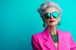 © Olsek - A stylish older woman poses in vibrant pink attire. Her sunglasses reflect the bright background. Bold fashion choices celebrate confidence and beauty. Generative AI
