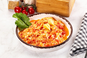 Shakshuka with tomato for breakfast