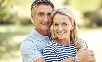 Poster - Portrait, hug and mature couple in nature at park for bonding, marriage and connection in morning. Outdoor, happy and man and woman embracing in garden for romance on date with love and care together