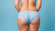 © Satyapal - female body buttocks' fittings in light blue lingerie