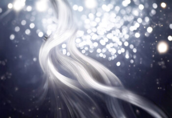 Leinwandbilder - White streaks of light curve and twist against a dark, bokeh background.