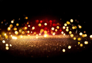 Abstract background of red and gold bokeh lights on top of glittery surface