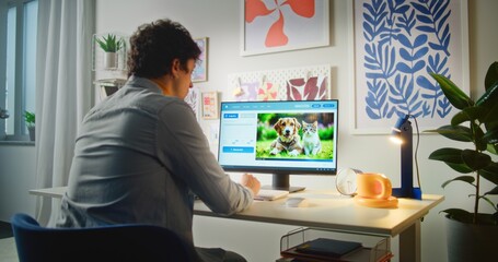 Fototapete - Back view of young man typing prompt in AI image generator on PC. Artificial intelligence chatbot generates detailed photo of cute dog and cat. From text prompt to realistic image. Automated artwork.