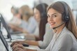 © Abdul - A friendly team of diverse customer service agents working together in an open office, with a focus on a Russian-speaking representative assisting a client via a laptop