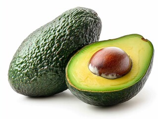 Closeup of a fresh halved avocado with the pit showcasing the creamy vibrant green texture and isolated on a clean white background