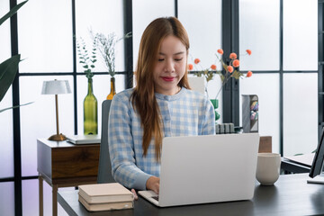 Young woman working in the office.