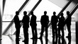 © Felippe Lopes - Silhouettes of men in suits standing in a modern office building.