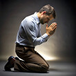 © Wilson - man on his knees praying